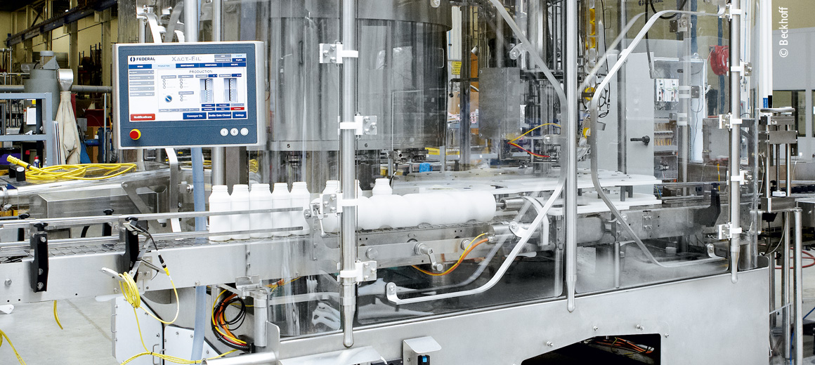 Filling machines for liquid products with reduced footprint